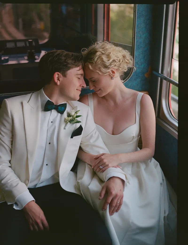 couple riding in Montenvers Train Chamonix French Alps, destination wedding